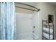 Bathroom features a bathtub, white tile, and a towel rack for storage at 511 Nandina Dr, Goose Creek, SC 29445