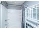 Bathroom featuring a tub with a shower and a storage cabinet for storing your towels and toiletries at 511 Nandina Dr, Goose Creek, SC 29445