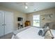 Bedroom features a comfortable bed, TV, and window with neighborhood views at 511 Nandina Dr, Goose Creek, SC 29445