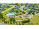 An aerial view showcasing the community pool, playground, and green space in a Gathering-friendly neighborhood at 511 Nandina Dr, Goose Creek, SC 29445