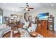 Spacious living room with hardwood floors, open to dining area and staircase at 511 Nandina Dr, Goose Creek, SC 29445