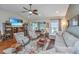 Spacious living room with hardwood floors, ceiling fan, and comfortable seating arrangement at 511 Nandina Dr, Goose Creek, SC 29445
