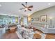 Open-concept living area with hardwood floors, ceiling fan, and comfortable seating at 511 Nandina Dr, Goose Creek, SC 29445