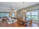 Spacious open-concept living area with a dining table and connecting living room at 511 Nandina Dr, Goose Creek, SC 29445