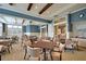 Spacious card room with comfortable seating, natural light, and stylish decor at 522 Tidewater Chase Ln, Summerville, SC 29486