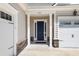 Close-up of the front entrance featuring a dark blue front door with sidelights at 522 Tidewater Chase Ln, Summerville, SC 29486