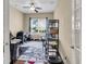 Well-lit home office with hardwood floors, a ceiling fan, and ample workspace at 522 Tidewater Chase Ln, Summerville, SC 29486