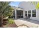 Rear screened porch with room to enjoy relaxing times outdoors at 522 Tidewater Chase Ln, Summerville, SC 29486