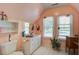 Bright bathroom features white fixtures, natural light, and a charming vintage aesthetic at 5615 Highway 165, Ravenel, SC 29470