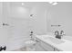 Clean bathroom features a combined tub and shower with neutral decor and modern hardware at 5655 Captain Kidd Rd, Hollywood, SC 29449