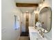 Bathroom with double sink vanity, new fixtures, and marble-tiled shower, providing a spa-like experience at 6086 Chisolm Rd, Johns Island, SC 29455