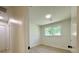 Bedroom with a light, neutral paint and wood-look flooring with a light-filled window at 6086 Chisolm Rd, Johns Island, SC 29455