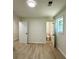 Bedroom features new flooring, paint and trim and an adjacent bathroom with tile flooring at 6086 Chisolm Rd, Johns Island, SC 29455