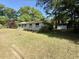 Attractive one-story home with well-maintained lawn and a detached storage shed at 6086 Chisolm Rd, Johns Island, SC 29455