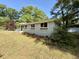 Attractive one-story home with well-maintained lawn at 6086 Chisolm Rd, Johns Island, SC 29455