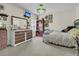 A comfortable bedroom featuring a classic dresser and a decorative wall mirror at 707 Jancus St, Charleston, SC 29414