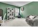 A cozy room with a fuzzy chair, and built in storage at 707 Jancus St, Charleston, SC 29414