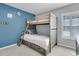 A bedroom with bunk beds, built in storage, and bright interior paint at 707 Jancus St, Charleston, SC 29414