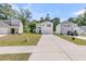 Charming home with a well-maintained front yard and long driveway at 707 Jancus St, Charleston, SC 29414