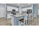 Modern kitchen with granite countertops, stainless steel appliances, and white cabinets at 707 Jancus St, Charleston, SC 29414