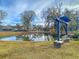 Picturesque pond with a bench and gazebo, perfect for relaxing by the water at 707 Jancus St, Charleston, SC 29414