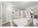 Cozy dining space features a white table set and transitions to kitchen and living areas at 7999 Vermont Rd, North Charleston, SC 29418