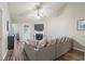 Inviting living space with fireplace, hardwood floors, and access to outdoor area at 7999 Vermont Rd, North Charleston, SC 29418