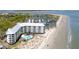 Community offering pool, beach access, and lush landscaping at 9002 Palmetto Dr # 119, Isle of Palms, SC 29451