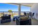 Relaxing outdoor patio featuring comfortable seating and beautiful views of the ocean at 9002 Palmetto Dr # 119, Isle of Palms, SC 29451