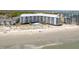 Aerial view of beachfront condominium with a pool, and plenty of beach access at 9002 Palmetto Dr # 119, Isle of Palms, SC 29451