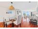 Open-concept living and dining area with comfortable seating and beautiful ocean views at 9002 Palmetto Dr # 119, Isle of Palms, SC 29451