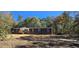 Charming single-story home surrounded by mature trees at 945 Tiger Loop, Saint Stephen, SC 29479