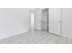 Bedroom with an open closet and tiled floors at 9630 Crosscut Dr, Ladson, SC 29456