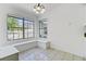 Bright eat-in breakfast nook with large windows and built-in bench seating at 9630 Crosscut Dr, Ladson, SC 29456