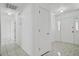 Hallway with neutral colors and ceramic tile at 9630 Crosscut Dr, Ladson, SC 29456