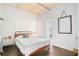 A stylish bedroom with a bed and nightstand at 1 Cool Blow St # 337, Charleston, SC 29403