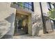 Close-up of the secure building entrance with decorative iron gate and unit numbers at 1 Cool Blow St # 337, Charleston, SC 29403