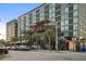 Exterior view of mixed use building with outdoor dining on top at 1 Cool Blow St # 337, Charleston, SC 29403