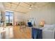 Open-concept living room with large windows, hardwood floors, and modern decor at 1 Cool Blow St # 337, Charleston, SC 29403
