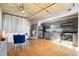 Living room featuring an open kitchen and hardwood floors, illuminated by a ceiling fan at 1 Cool Blow St # 337, Charleston, SC 29403
