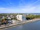 Stunning aerial view showcasing the condo, city skyline, harbor, and nearby Ravenel Bridge at 1 King St # 501, Charleston, SC 29401