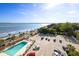Stunning aerial view showcasing the pool, parking, and ocean at 1 King St # 501, Charleston, SC 29401