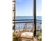 Balcony with wicker chair and water view at 1 King St # 501, Charleston, SC 29401