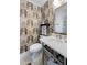 Bathroom with vanity, attractive wallpaper and walk-in shower at 1 King St # 501, Charleston, SC 29401