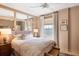 Light-filled bedroom with water view, mirrored wall, and neutral color palette at 1 King St # 501, Charleston, SC 29401