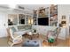 Comfortable living room with stylish furnishings, custom built-in shelving, and lots of natural light at 1 King St # 501, Charleston, SC 29401