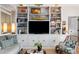 Bright living room featuring beautiful built-in shelving perfect for storage and displaying decor at 1 King St # 501, Charleston, SC 29401