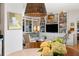Inviting living room with custom built-in shelving and stylish decor, adjacent to the dining area at 1 King St # 501, Charleston, SC 29401