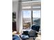 Bright living room with balcony and water view at 1 King St # 501, Charleston, SC 29401