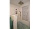 Modern bathroom with mosaic wall tile accents, a shower, and ample lighting at 1044 Towhee Ln, McClellanville, SC 29458